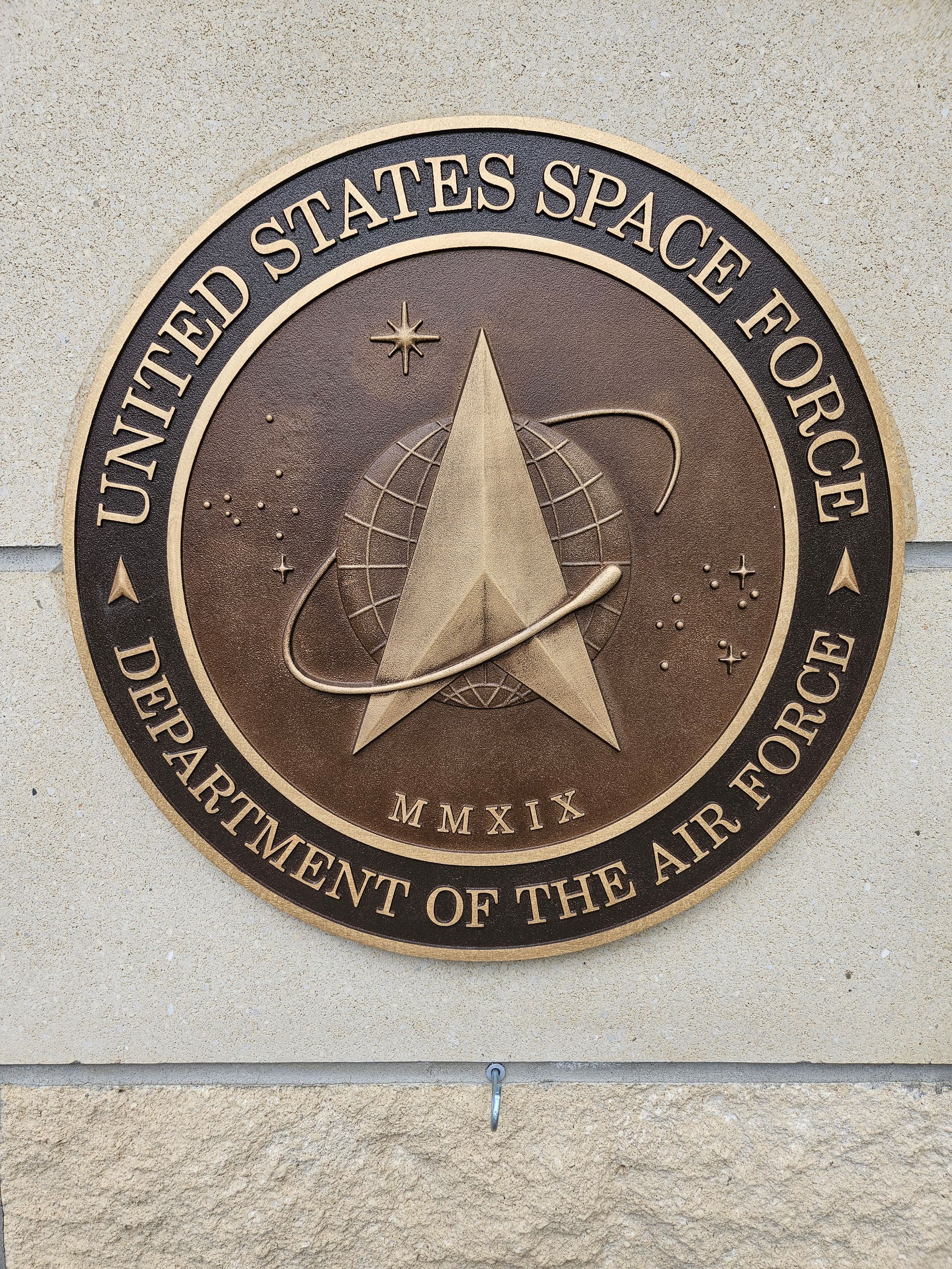 A plaque for the united states space force department of the air force