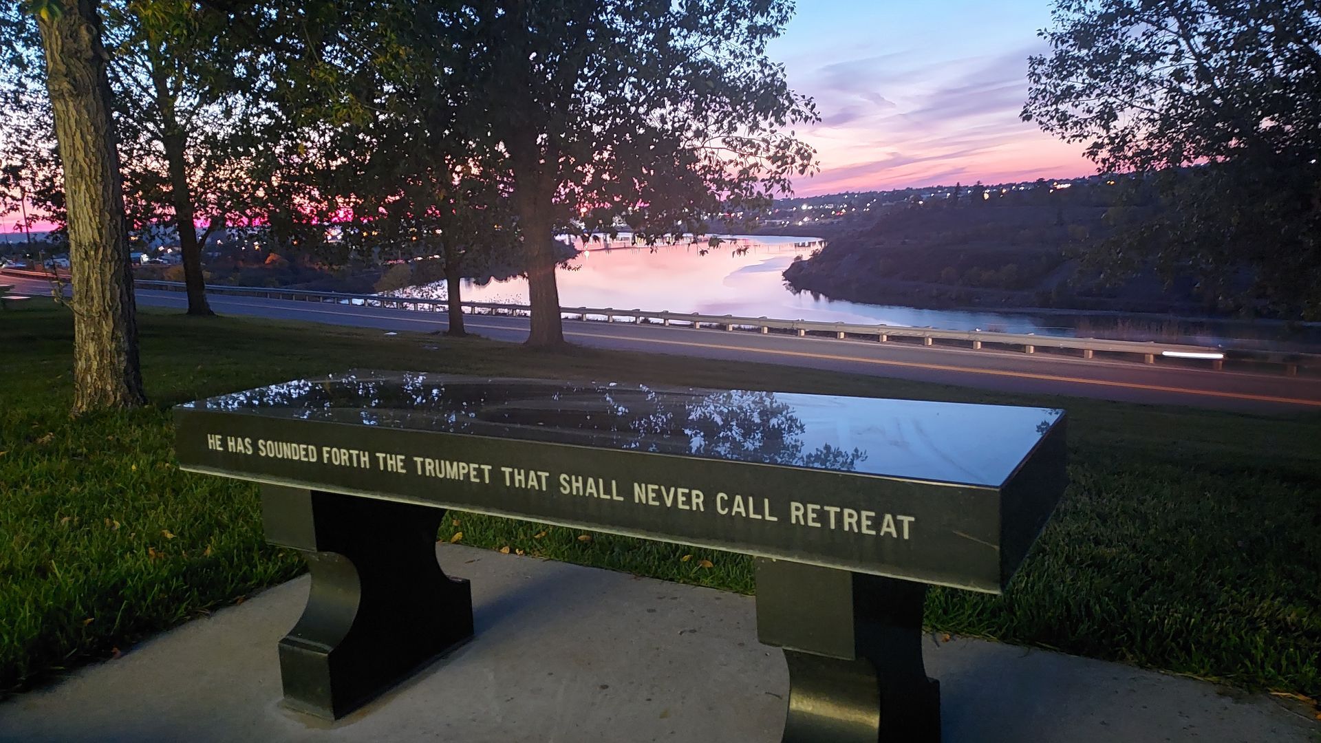 A park bench with the words 