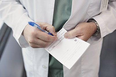 doctor writing a prescription