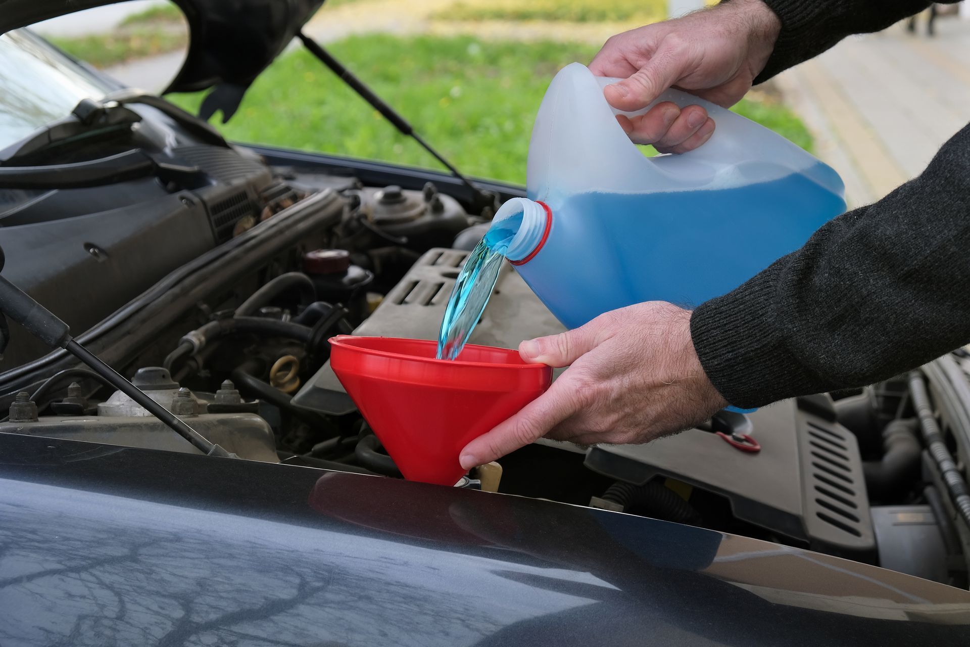 The Truth About Topping Off Windshield Wiper Fluid: Can You Use Water? | Forthright Auto Repair