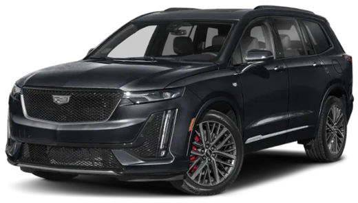 Black Cadillac XT6 SUV. Front view, red brake calipers, sporty grille, on a sunny day.