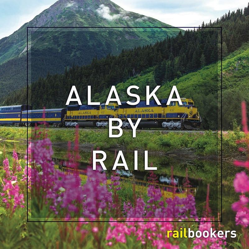 Alaska Railroad train travels through a scenic landscape with mountains and wildflowers.