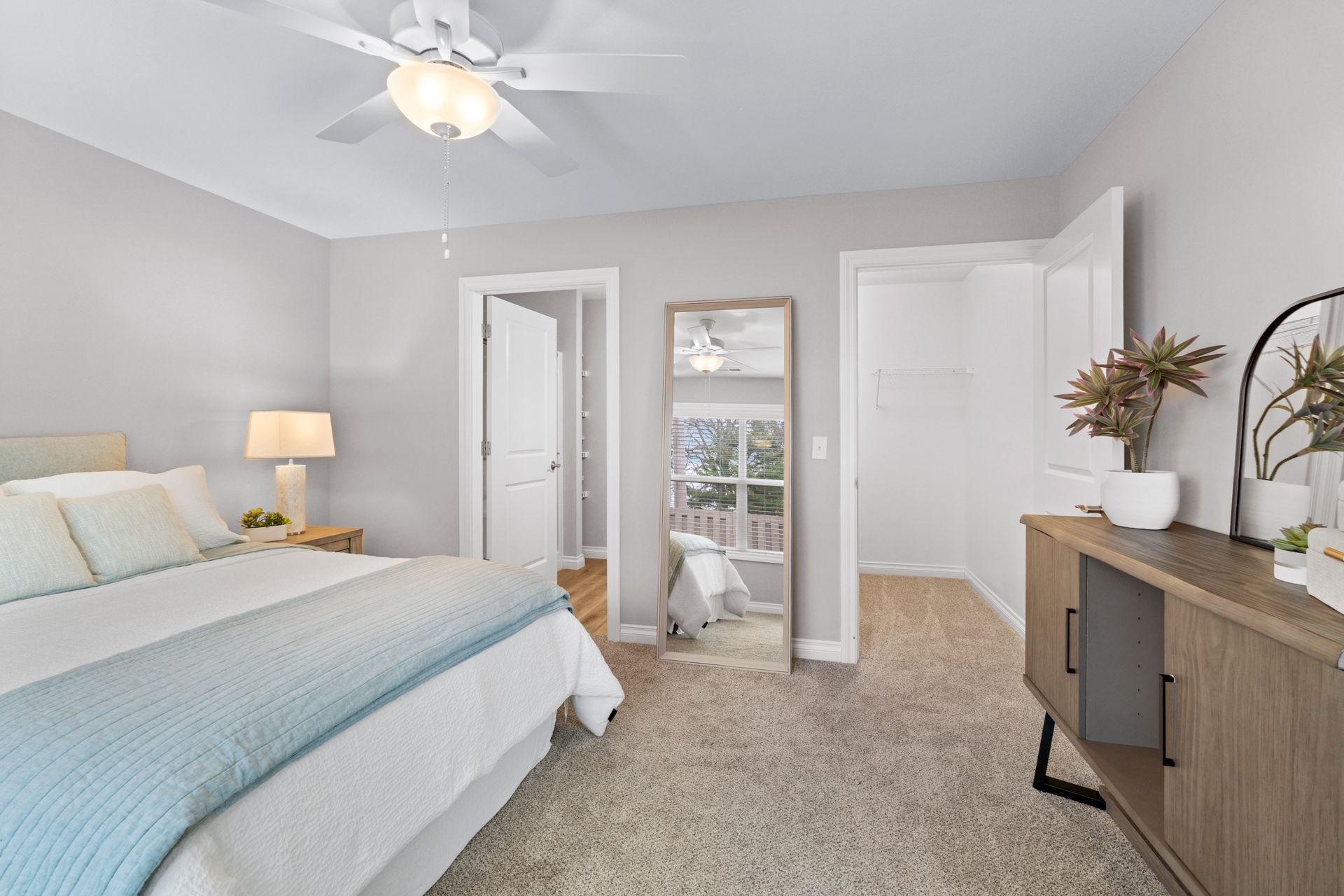 Photo of a bedroom showing a large bed and still plenty of walking space