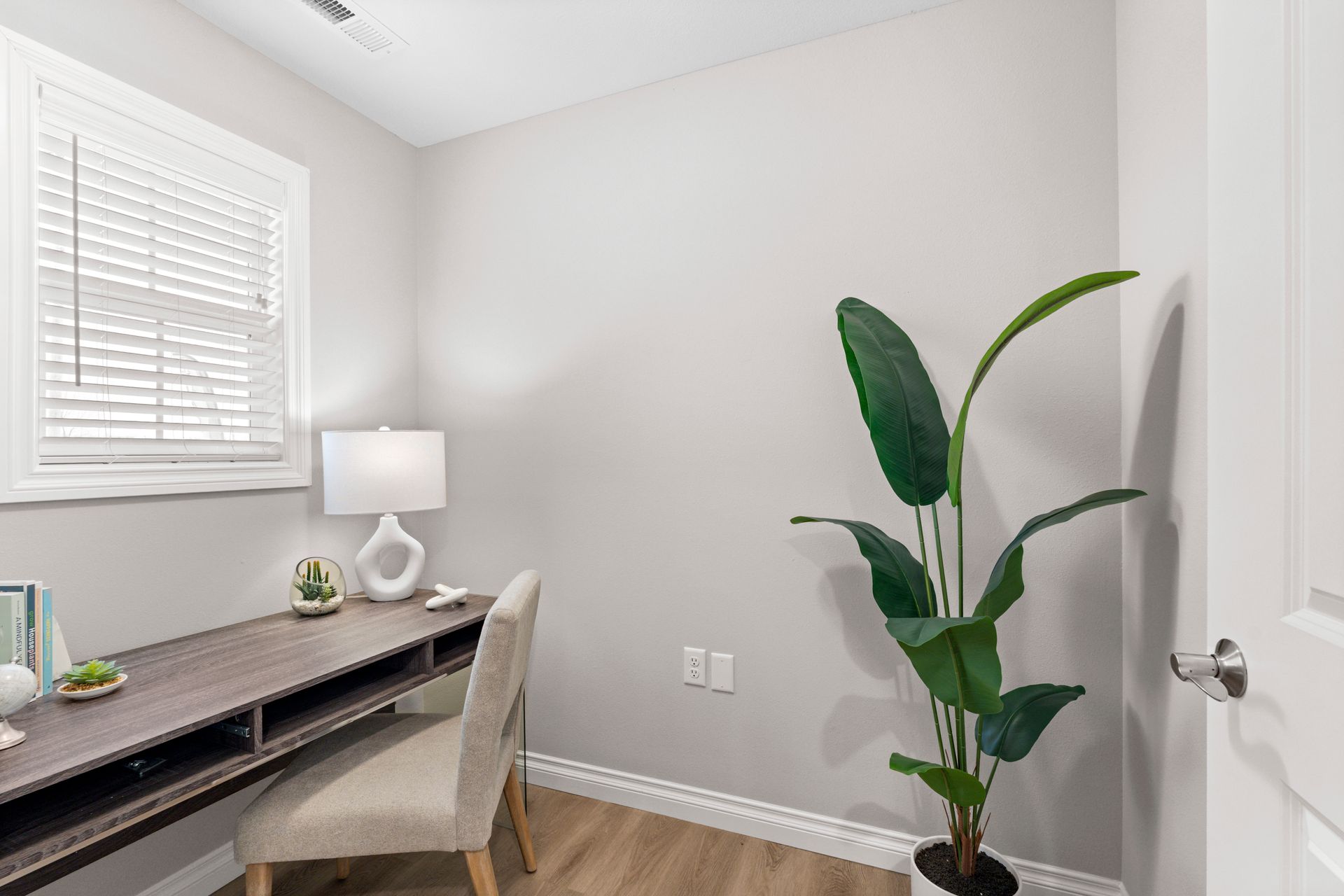 Photo of a desk in a small office-type of room