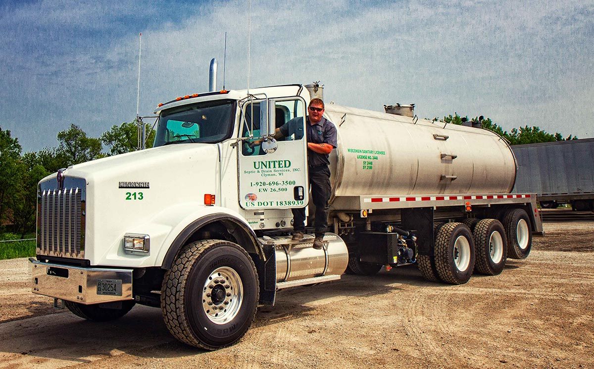 Septic Truck with Worker — Clyman, WI — United Septic & Drain Services Inc