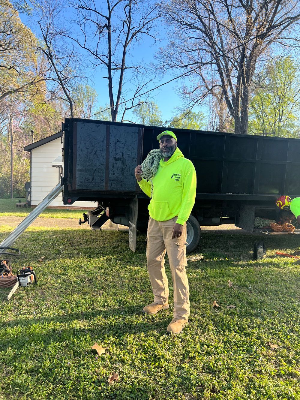 A Man Standing | Charlotte, NC | Elephant Trunk Tree and Landscaping