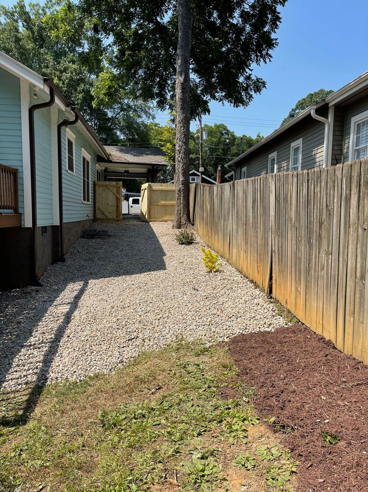 Landscaped Side Of The Structure | Charlotte, NC | Elephant Trunk Tree and Landscaping