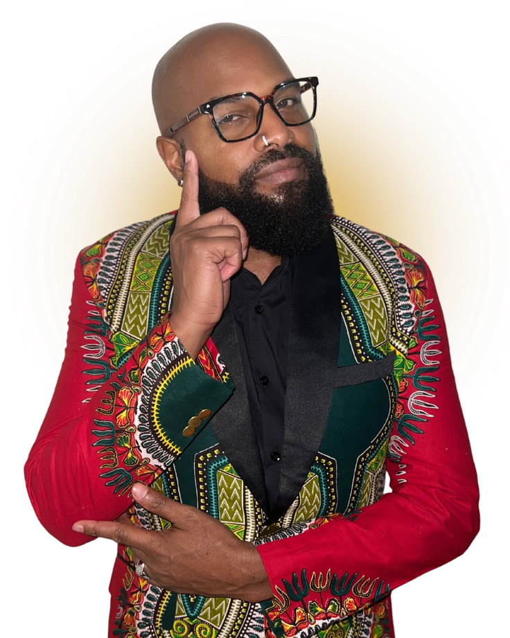 A man with a beard and glasses is wearing a colorful jacket.