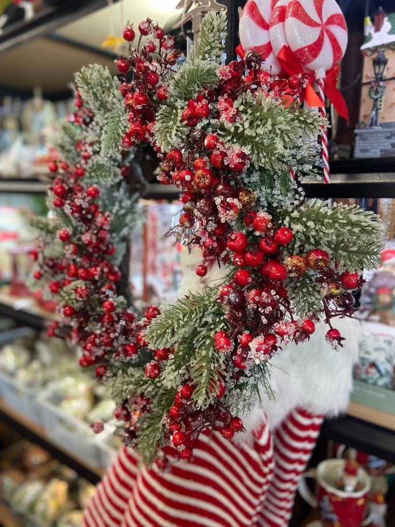 A Close Up of a Christmas Wreath With Red Berries — Nambour Heights Gifts & Christmas Shop in Sunshine Coast, QLD