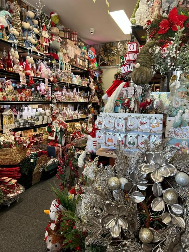 A Christmas Calendar With a Snowman Sitting on Top of It — Nambour Heights Gifts & Christmas Shop in Nambour, QLD