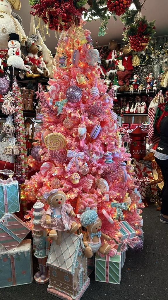 A Pink Christmas Tree Decorated With Candy Canes and Teddy Bears — Nambour Heights Gifts & Christmas Shop in Nambour, QLD