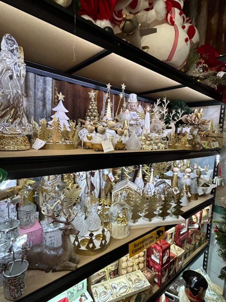 A Shelf Filled With Lots of Christmas Decorations in a Store — Nambour Heights Gifts & Christmas Shop in Sunshine Coast, QLD