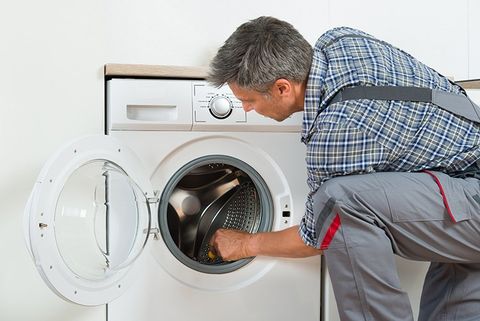 Troubleshoot Home — Repairman Checking the Washing Machine in Granite Falls, WA