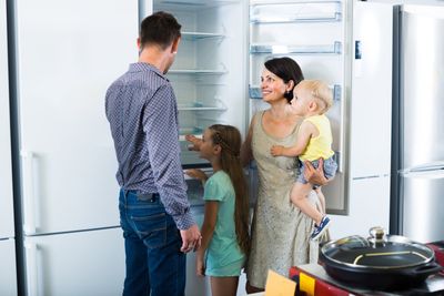 family buying refrigerator