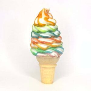 a rainbow colored ice cream cone on a white background