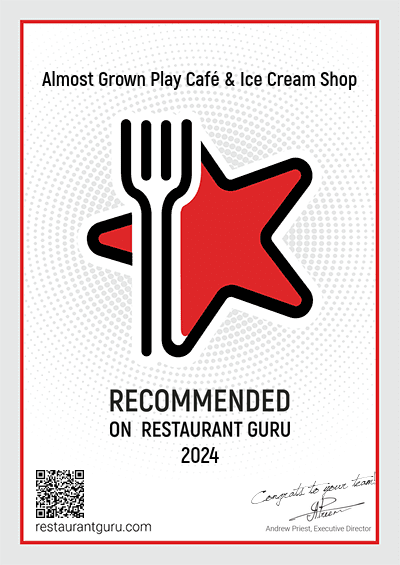 A poster that says almost grown play cafe & ice cream shop recommended on restaurant guru 2024