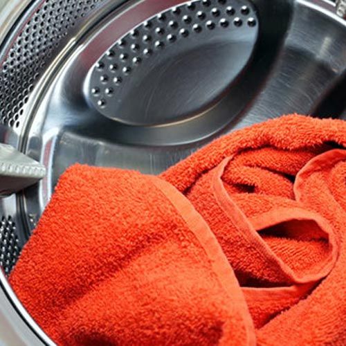 Bountiful — Orange Towel Inside a Dryer in Bountiful, UT