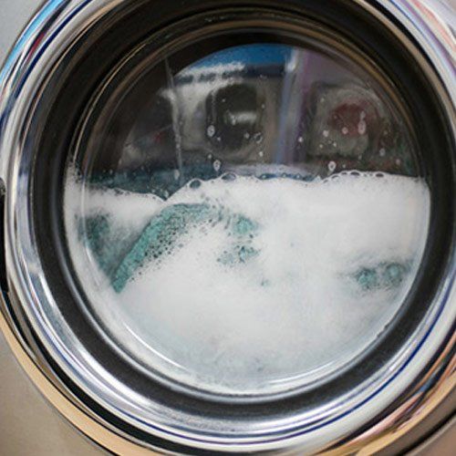 Home Appliances — Clothes Being Washed Inside a Washer in Bountiful, UT