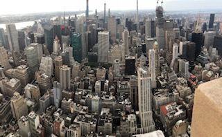 An aerial view of the city of new york from the top of the empire state building.