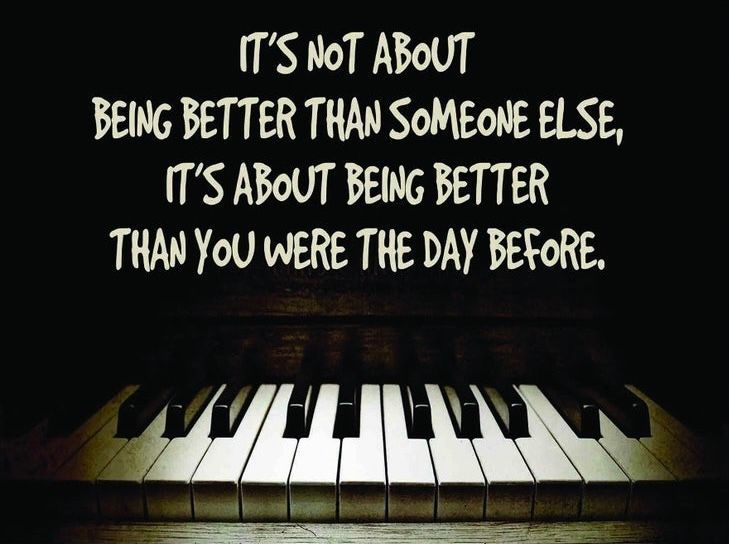 A piano with a quote that says it 's not about being better than someone else