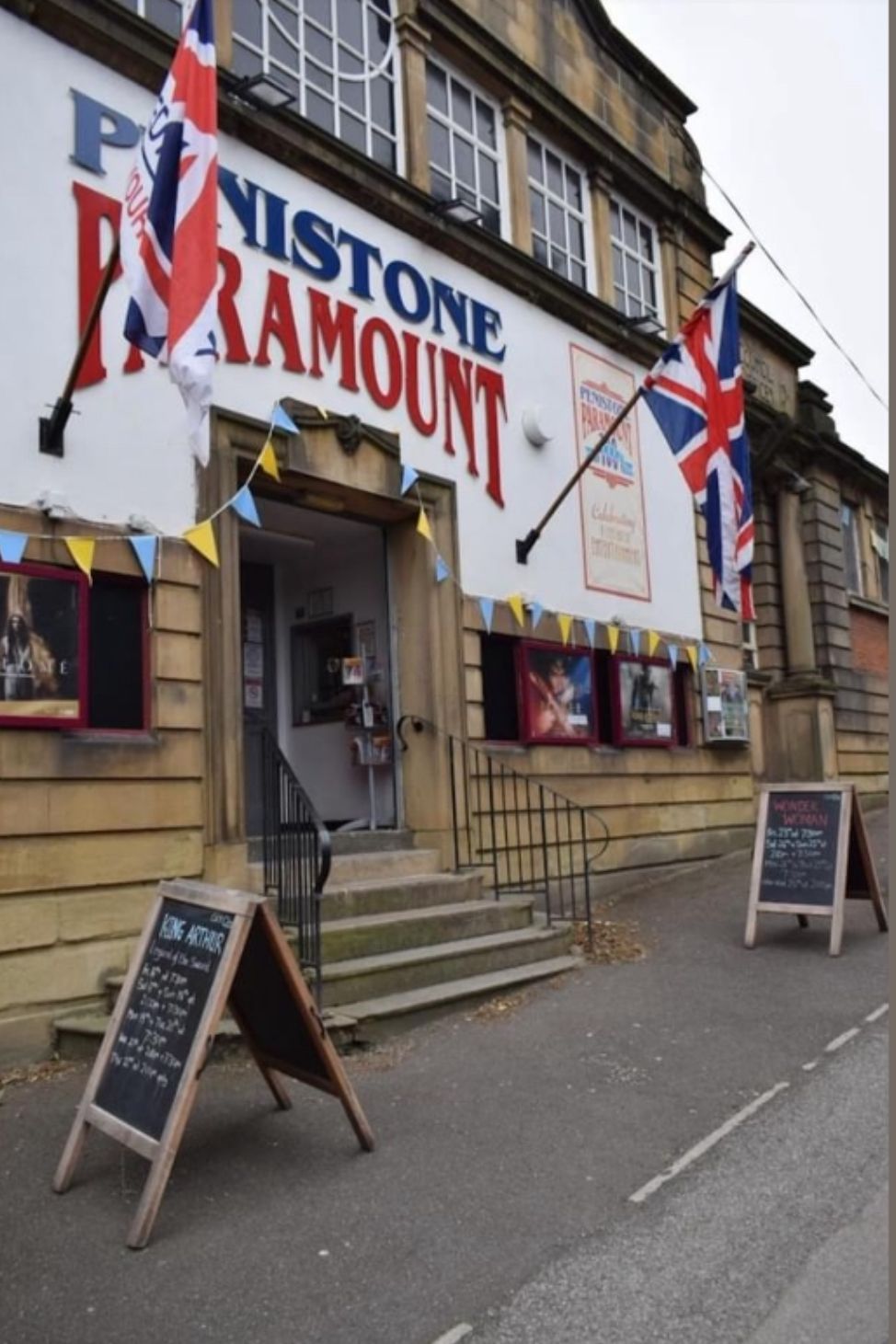 An outside shot of Penistone Paramount theatre's doors & signage.