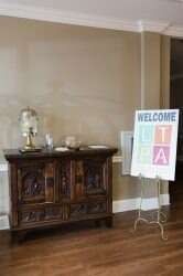 Antique wooden cabinet next to a 