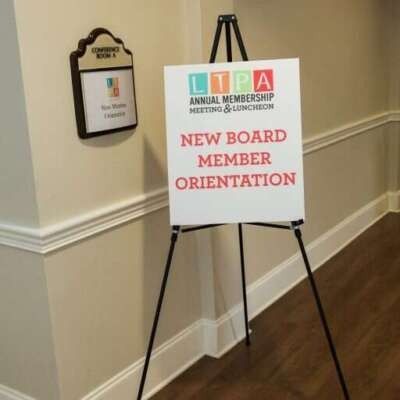 Sign on an easel reads 