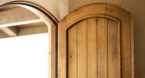 curved wooden door