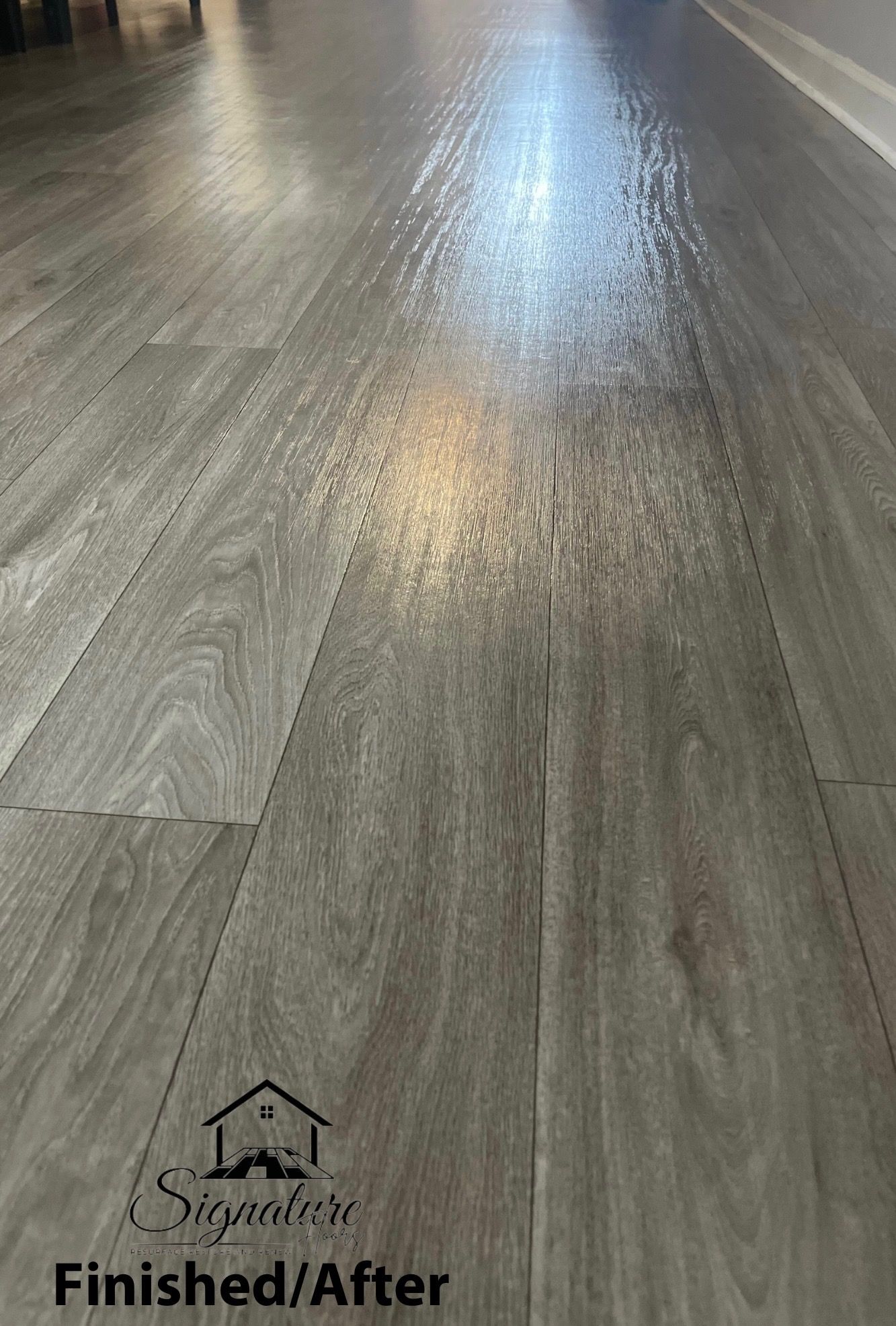A close up of a wooden floor that has been finished / after.