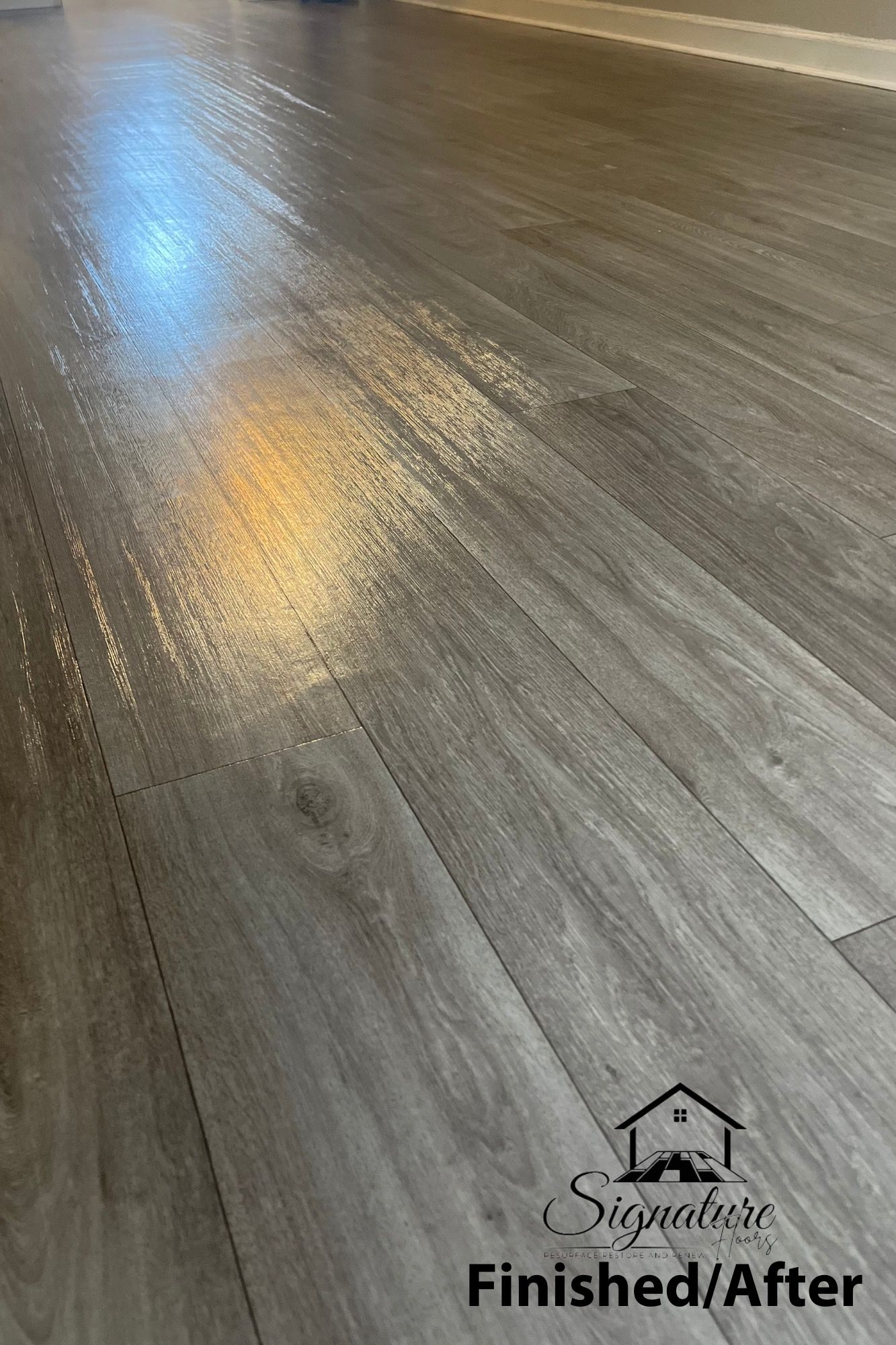 A close up of a wooden floor that has been finished.