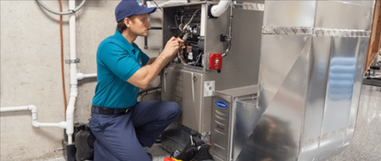 Professional technician performing oil to gas conversion installation service by DiRocco Plumbing & 