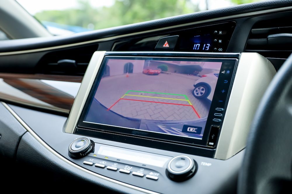 A Car Dashboard With a Rear View Camera on It — Crakka Windscreens in Diamond Beach, NSW