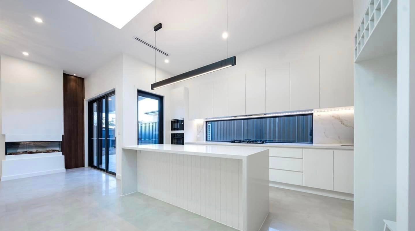 There Is A Large Island In The Middle Of The Kitchen — ASM Joinery In Fyshwick, ACT