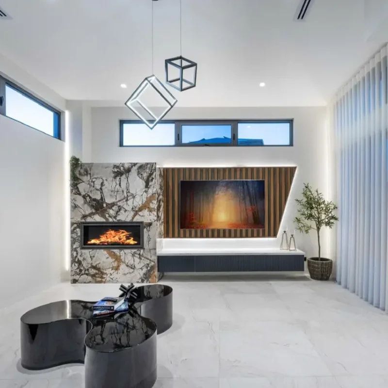 A Living Room With A Fireplace And A Television — ASM Joinery In Fyshwick, ACT