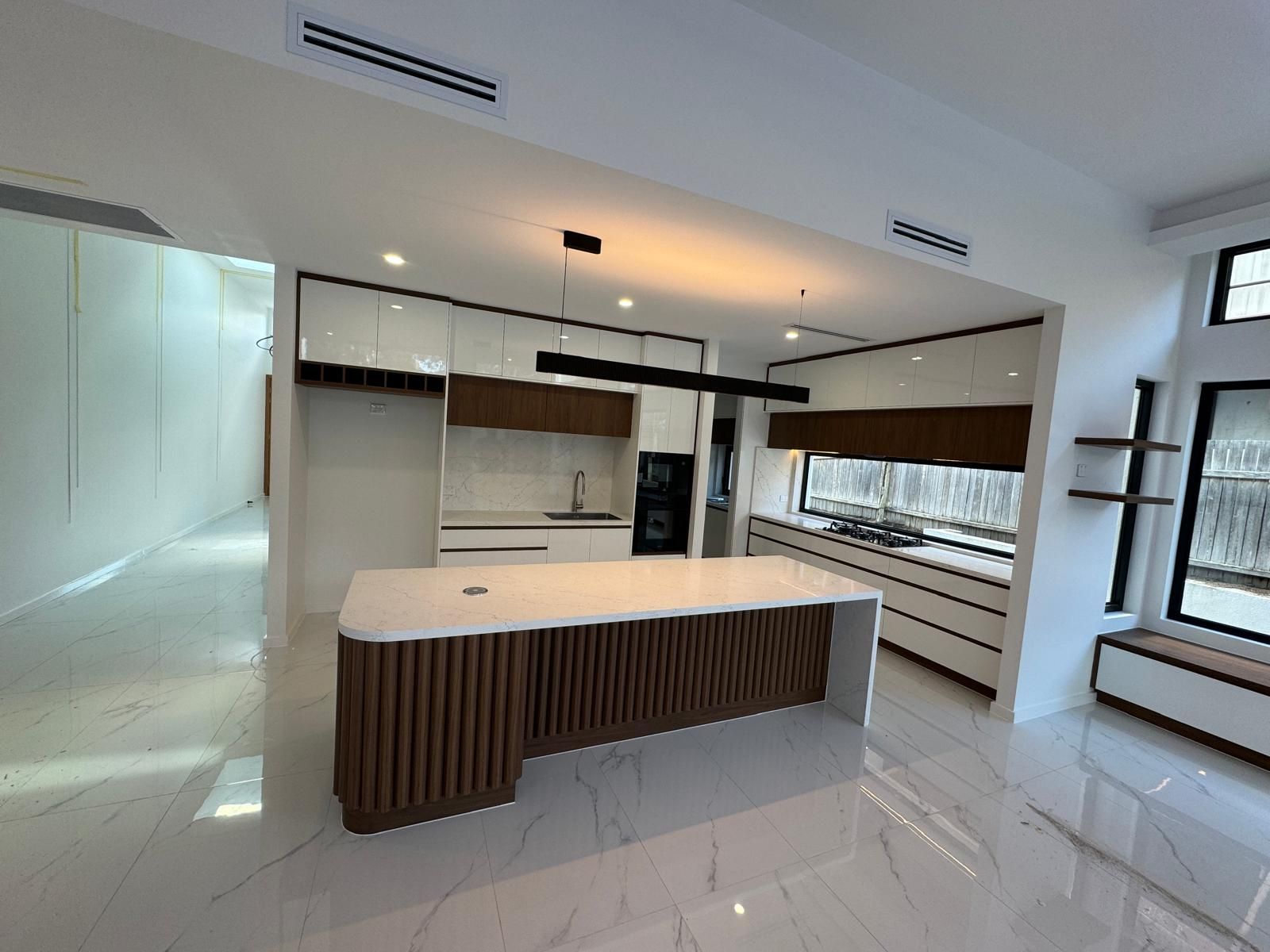 A Kitchen With White Cabinets And A Stainless Steel Sink — ASM Joinery In Fyshwick, ACT