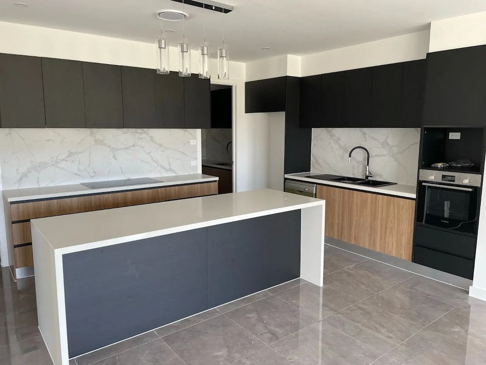 There Is A Large Island In The Middle Of The Kitchen — ASM Joinery In Fyshwick, ACT