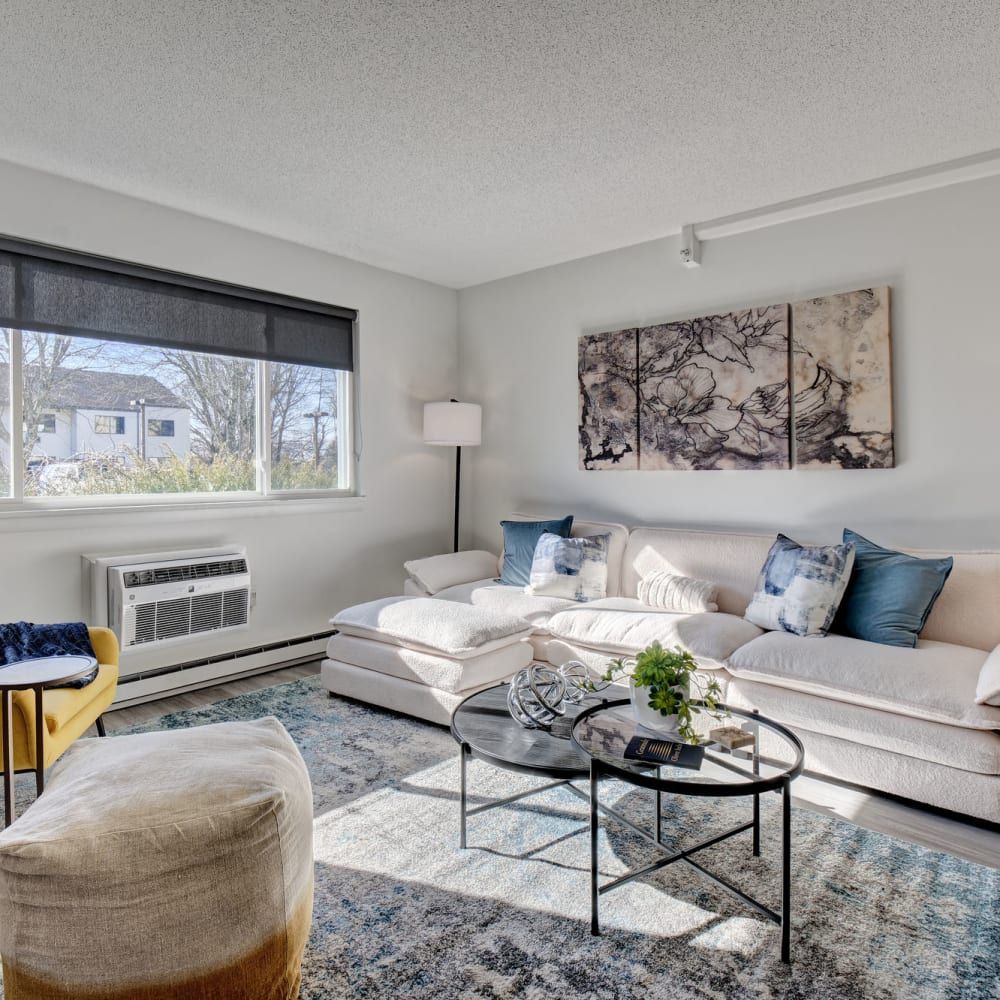 A living room with a couch and a coffee table
