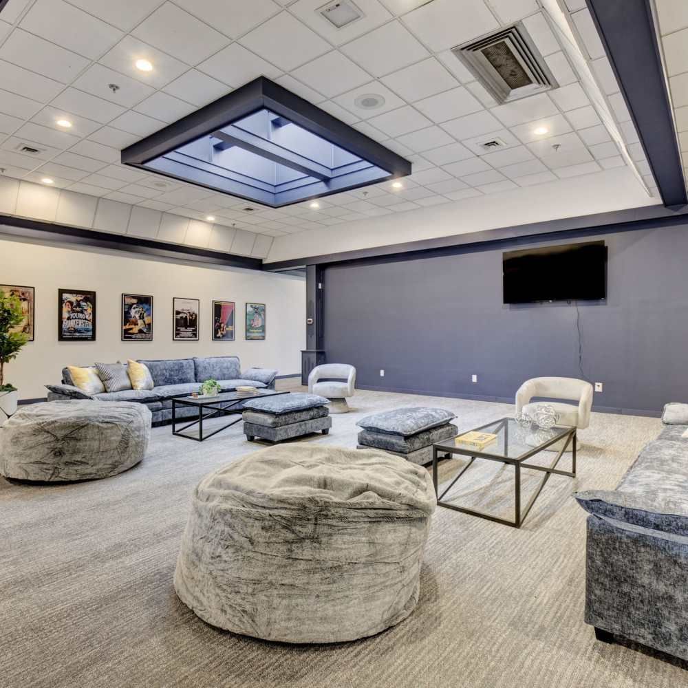 A living room filled with furniture and a television.