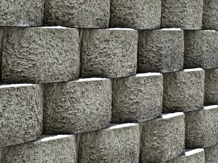 A Close Up of a Stone Wall Made of Concrete Blocks — Ape Earthmoving In Gatton, QLD