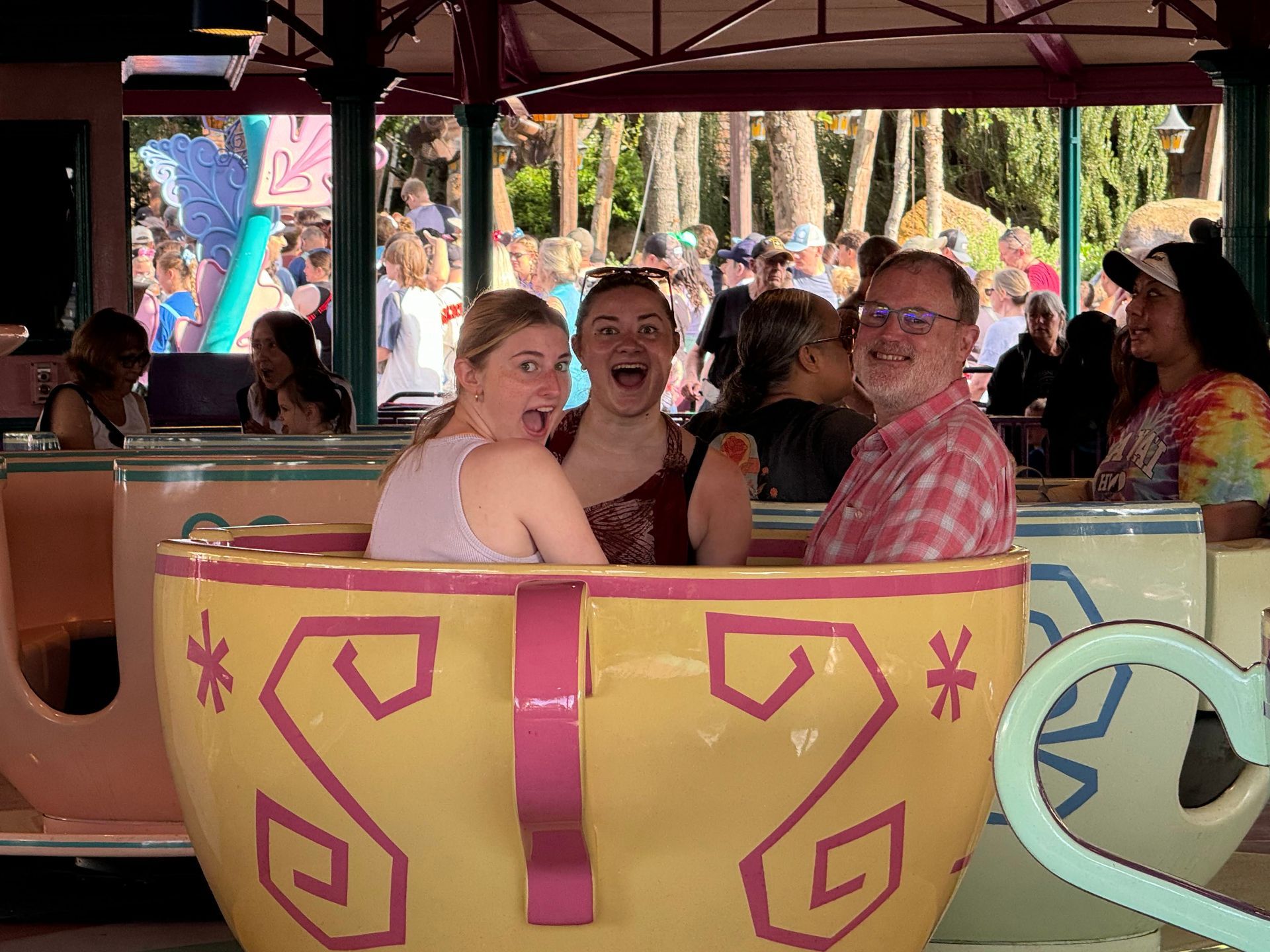 Tea Cup ride with daughter and father 