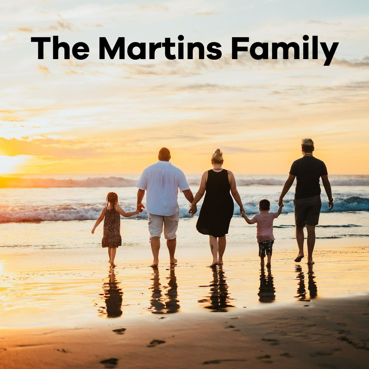 The martins family is walking on the beach at sunset