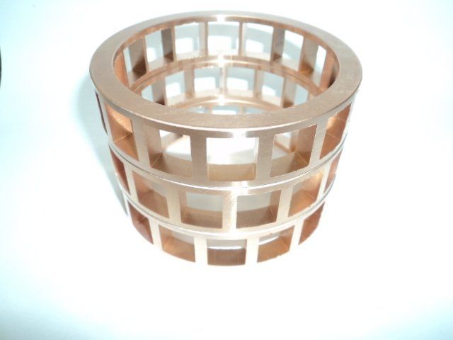Broached aerospace bearing cages