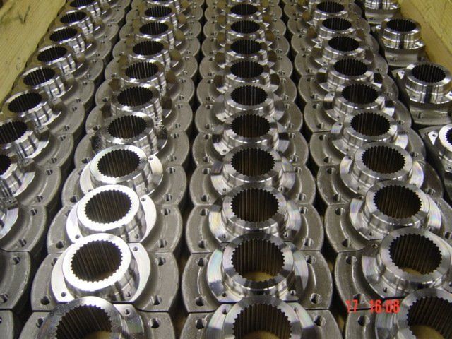 Broached flanges for fighting vehicles