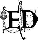 A black and white drawing of the letter ed with chains around it.