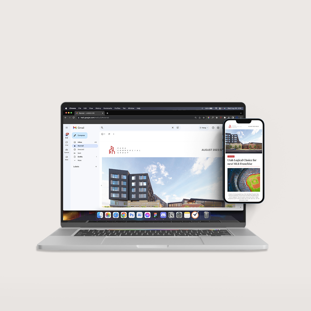 A laptop and a cell phone are sitting next to each other.