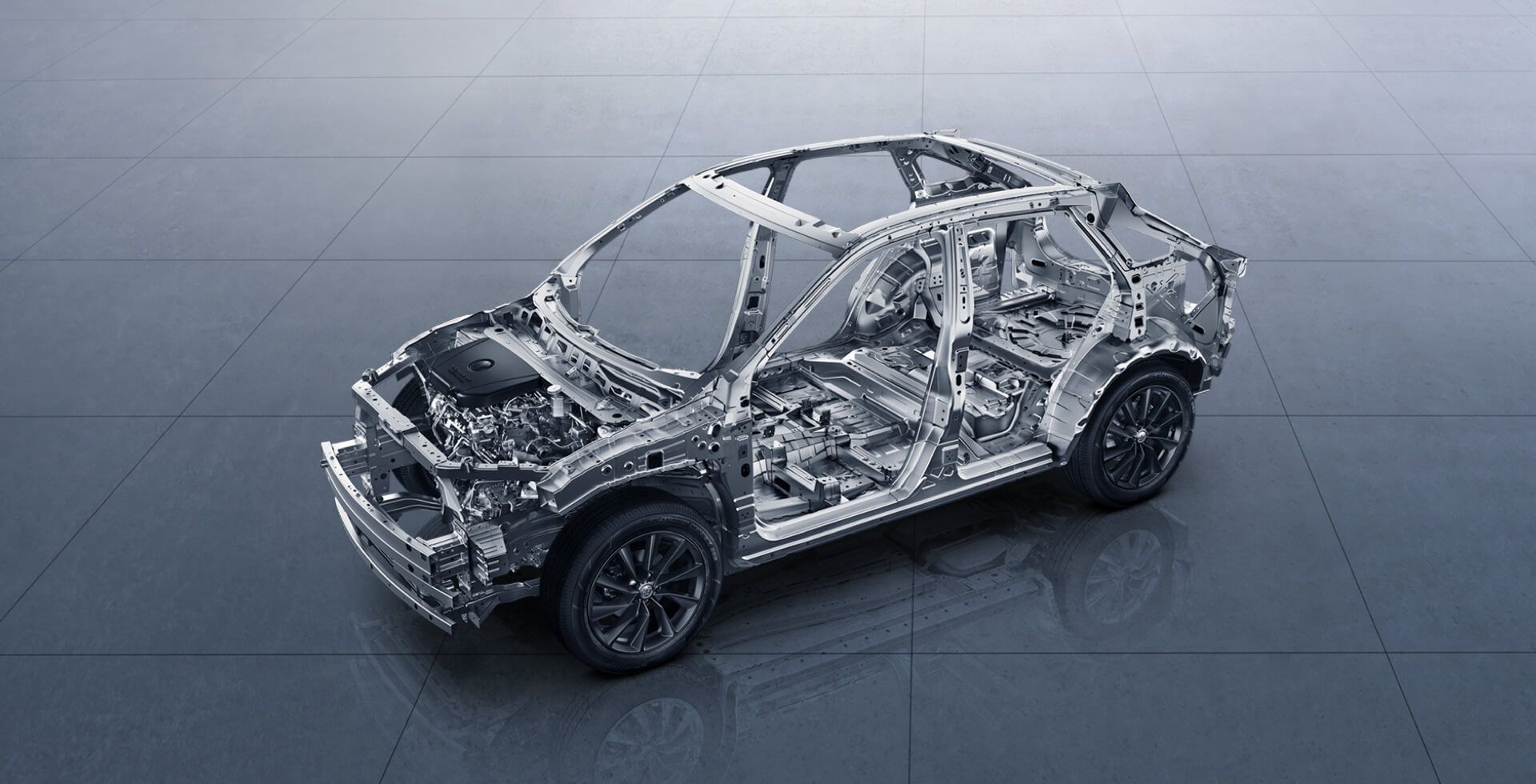 Cutaway view of a vehicle showing its internal frame, engine, and structural components.