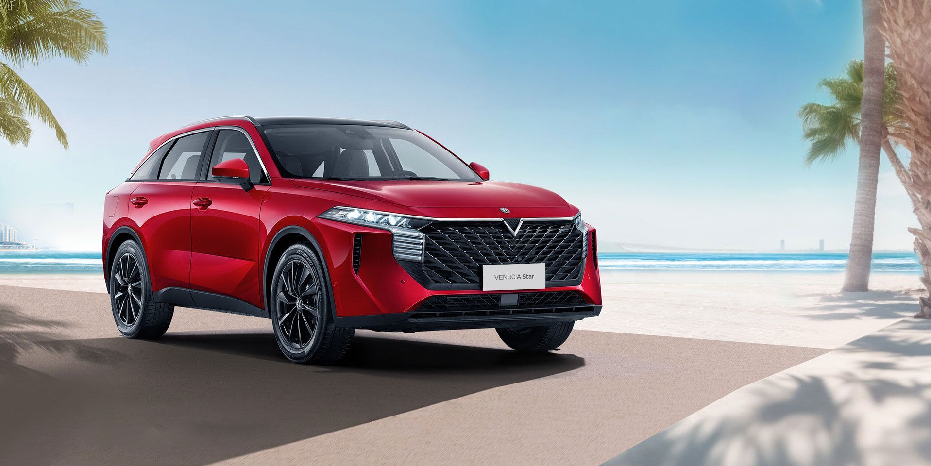Red SUV parked on a beach, palm trees in background, clear blue sky.