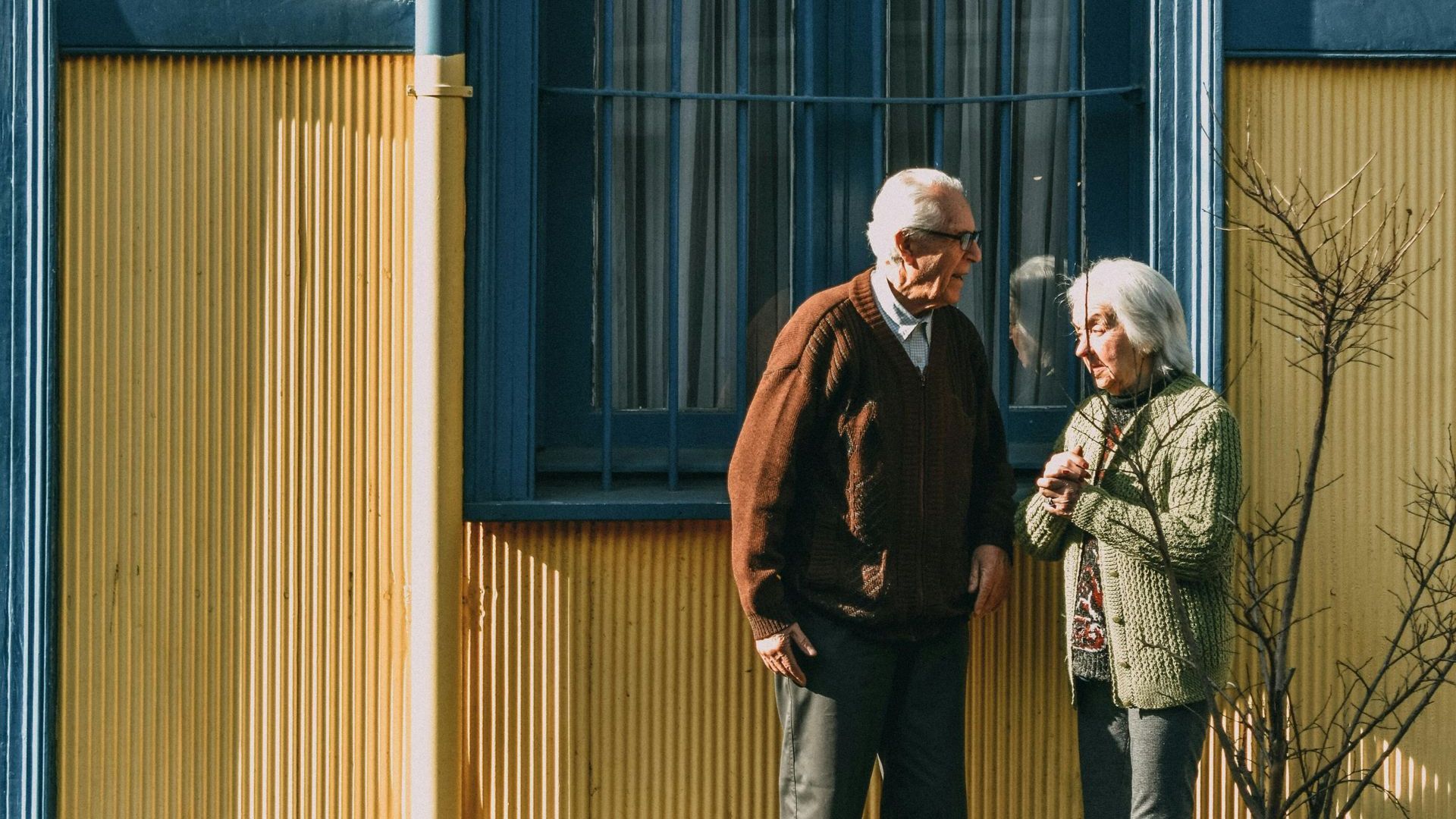 Elderly couple engaged in conversation