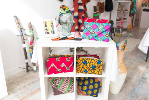 A shelf with a bunch of colorful boxes on it