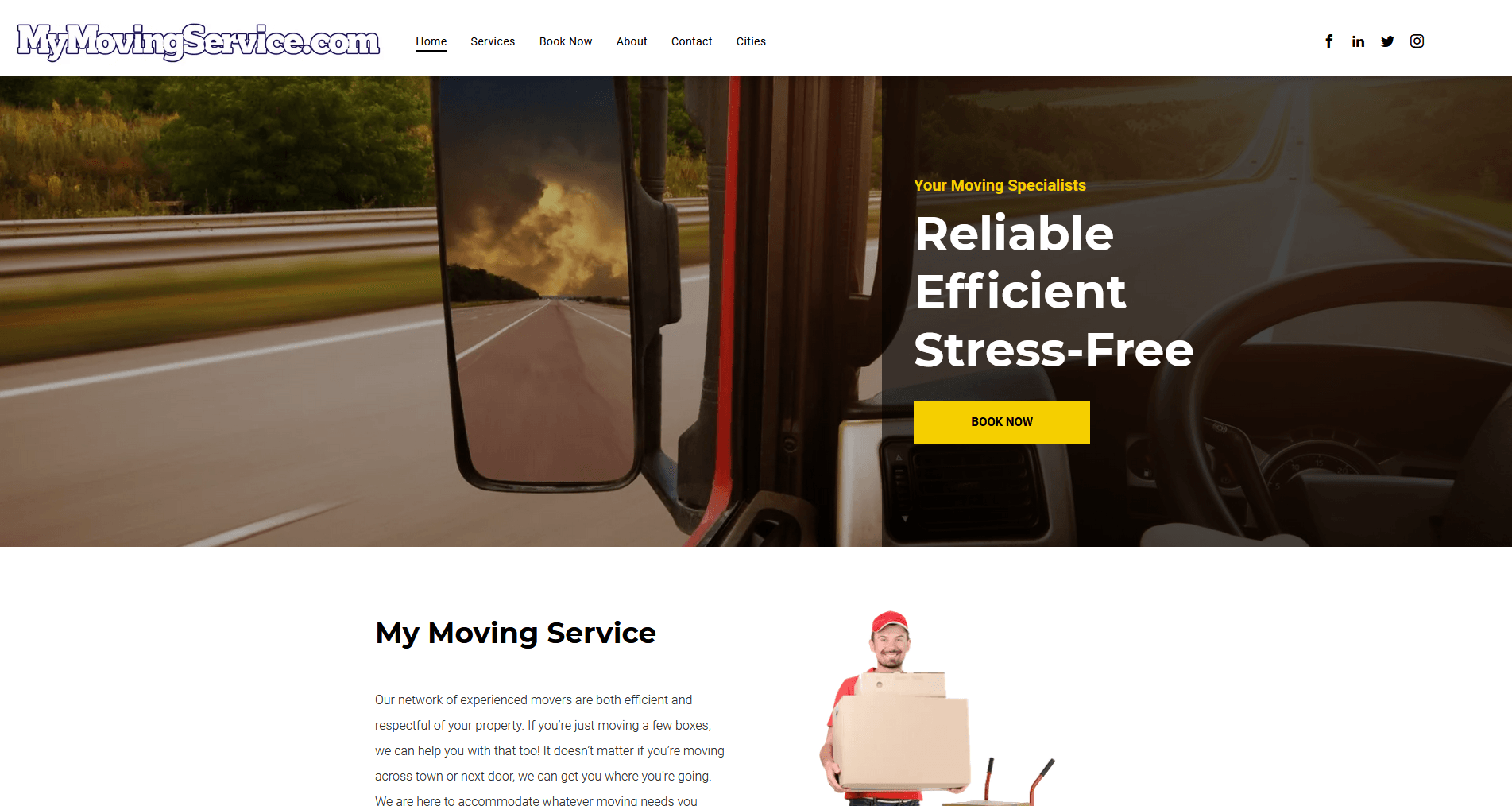 A man is holding a cardboard box in front of a truck.